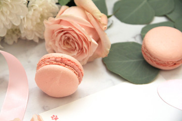 Composition for Valentine's day, macaroons, rose, eucalyptus, pink envelope