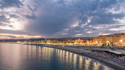 Fototapeta na wymiar Waterfront of Nice city and Mediterranean Sea day to night timelapse