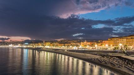Obraz premium Waterfront of Nice city and Mediterranean Sea day to night timelapse