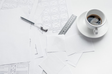 UX website designer drawing wireframe sketch of prototype, framework, layout future project....