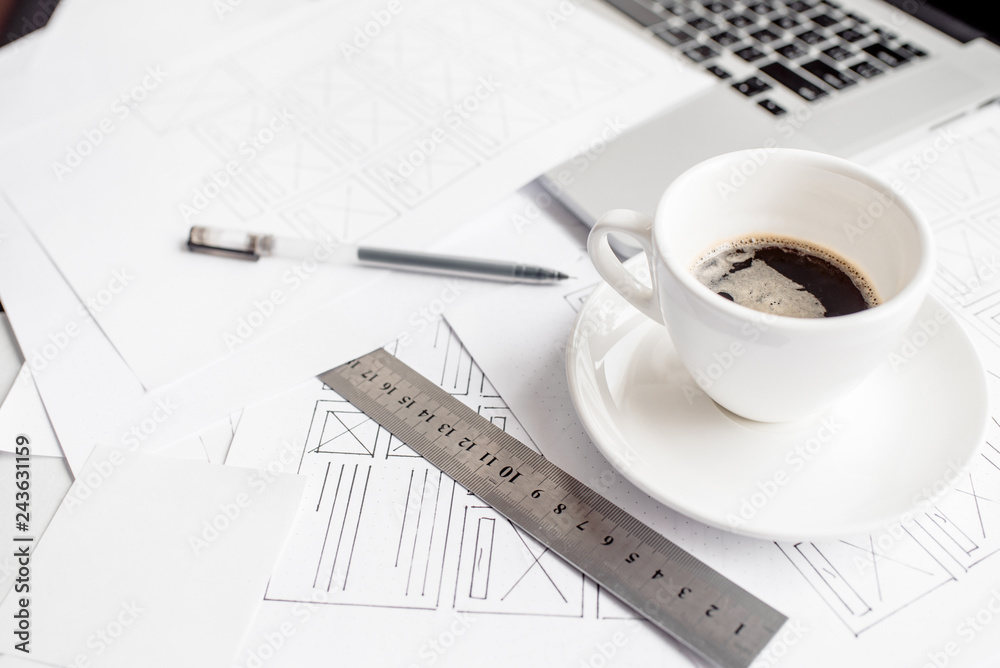 Wall mural ux website designer drawing wireframe sketch of prototype, framework, layout future project. creativ