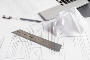 UX website designer drawing wireframe sketch of prototype, framework, layout future project....
