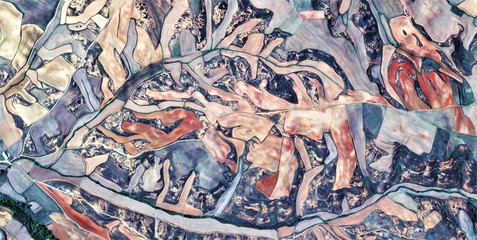 in a thousand pieces,  abstract photography of the Spain fields from the air, aerial view,...