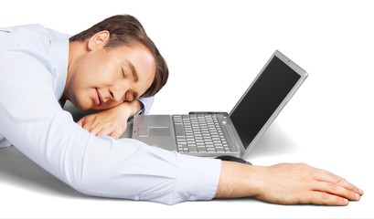 Portrait of a Businessman Sleeping at Work