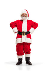 Hey, hello. Holly jolly x mas festive noel. Full length of funny happy santa in headwear, costume, black belt, white gloves, waves with arm palm standing at studio over white background
