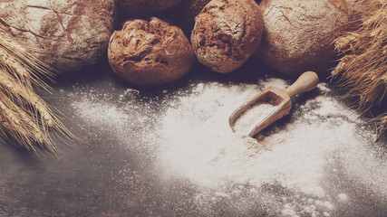 Freshly baked bread and flour in a bakery set