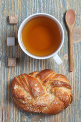 Tea and sweet homemade bun