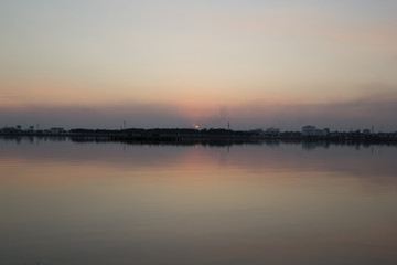 Fototapeta na wymiar sunset reflection in the lake