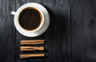 cup of coffee on wooden table