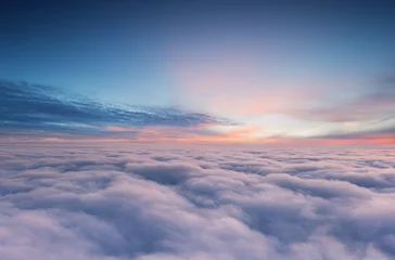 Foto op Plexiglas Zonsonderganghemel vanuit het vliegtuigraam © Lukas Gojda