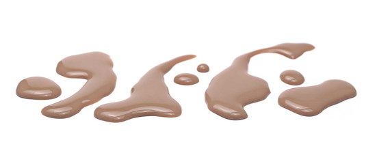 Spilled chocolate milk puddle isolated on white background