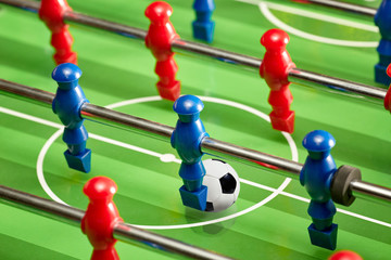 Table football with red and blue players