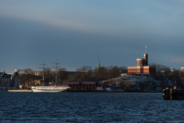 Fototapeta na wymiar View over boats and islands in Stockholm a winter day in winter solstice