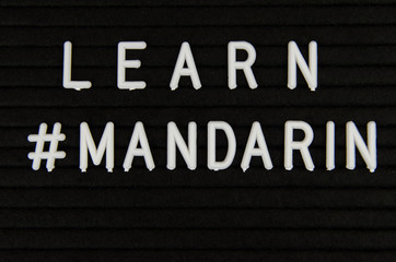 Learn languages sign on black background