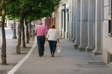 Senior couple walking street