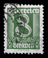 Stamp printed in Austria shows image of the number 8, circa 1925.