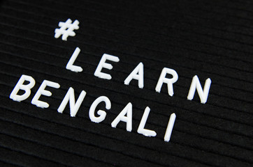 Fototapeta na wymiar Learn Bengali language, simple sign on black background, great for teachers, schools, students