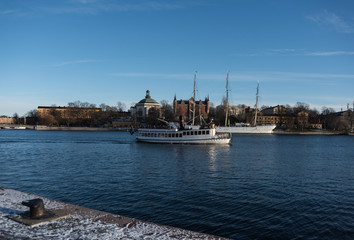 Naklejka premium View over boats and islands in Stockholm a winter day in winter solstice