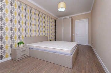 Fototapeta na wymiar New empty brown bedroom with twin bed and bedside tables