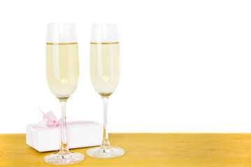 Glasses of champagne and Valentines day gift box Isolated.