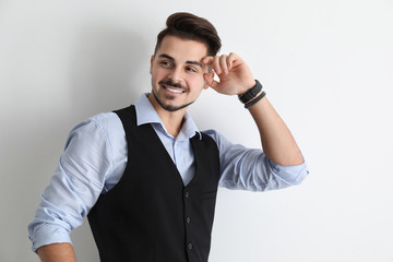 Stylish handsome man on white background