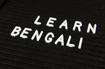Fototapeta premium Learn Bengali language, simple sign on black background, great for teachers, schools, students