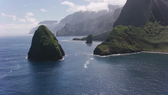 Molokai, Hawaii circa-2018.  Aerial view of rocks on Molokai coast.  Shot with Cineflex and RED Epic-W Helium. 