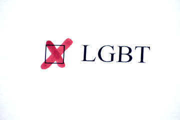 Checklist with a word LGBT on white paper. Checkbox concept.