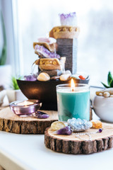 Relaxing spiritual Feng Shui altar set with nature, water and fire element. Tabletop small electrical fountain with water pouring cups. Symbol of wealth and prosperity. 