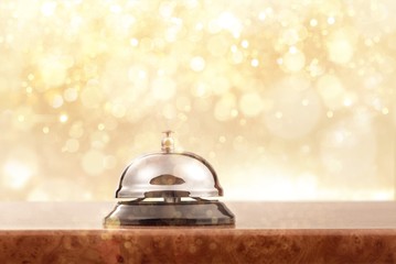 Vintage hotel reception service desk bell.