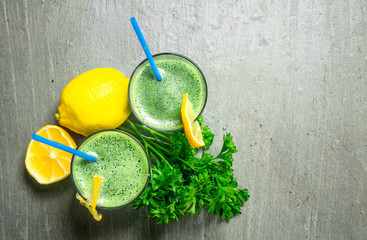 Healthy smoothie with lemon and parsley.