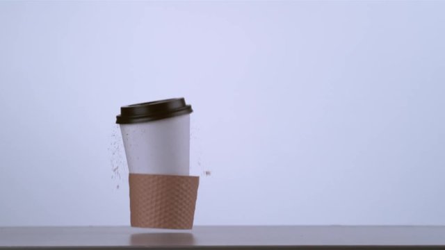 Slow motion shot of coffee spilling