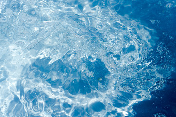 background image of water, blue water, bubbles, waves, stains 