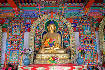 Obraz premium figure of Buddha and Prayer flag in the Five Pagoda Temple, Hohhot city, Inner Mongolia autonomous region, China