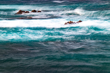 long exposure sea with rocks