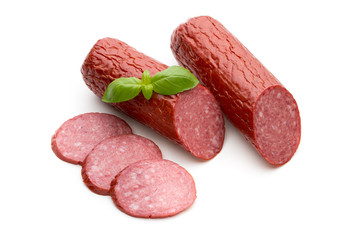 Salami smoked sausage, basil leaves on white background cutout.