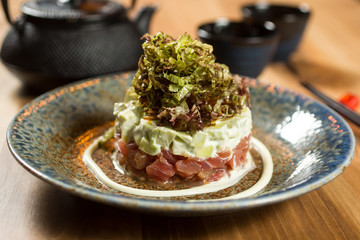 salad with avocado fresh tuna and dried onion