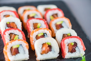  Sushi ready to eat on slate plate