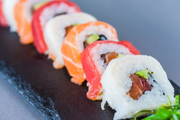  Sushi ready to eat on slate plate