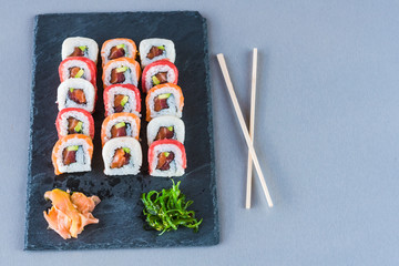  Sushi ready to eat on slate plate