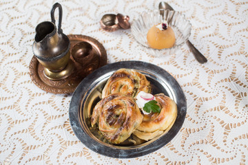 Homemade cheese and spinach pie on a  plate