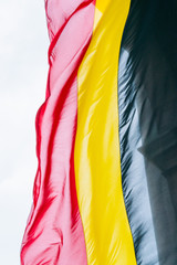 Belgium flag waving from Arcade du Cinquantenaire.
