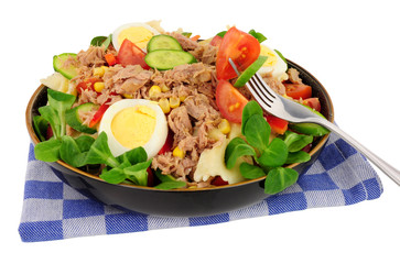 Tuna and pasta salad meal isolated on a white background