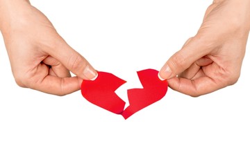 Female Hands Holding a Broken Heart