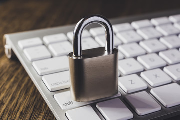 Close key lock on keyboard, dim light dark tone.