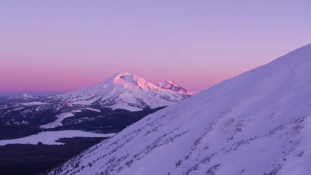 Oregon circa-2018. Aerial view of South Sister Mountain at sunrise. Shot from helicopter with Cineflex gimbal and RED Epic-W camera.
