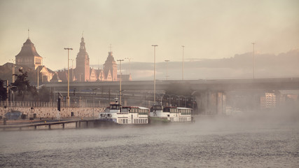 Szczecin City waterfront on foggy morning, color toning applied, Poland. - obrazy, fototapety, plakaty