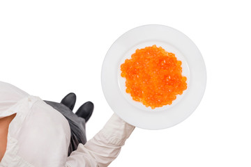 Top view of a waitress in a white blouse carrying plate with red salmon caviar on the white background. Concept. Isolated