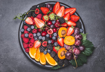 Fruits and berries bowl copy space.