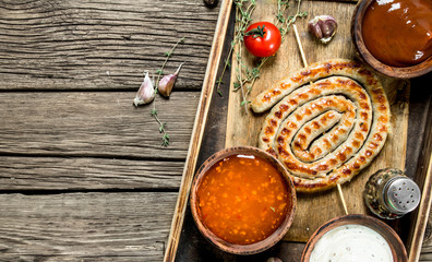 Grilled sausage and sauce.